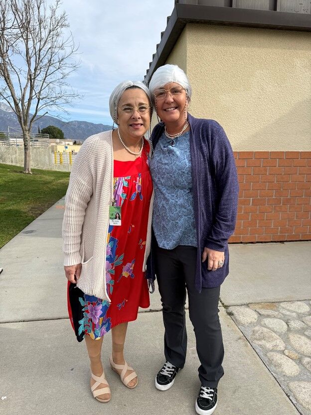 Image of two teachers dressed in costumes inspired by senior citizens.