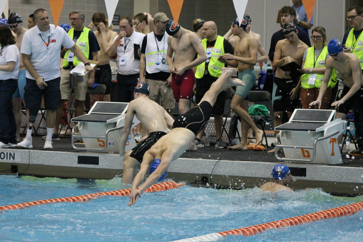 Paul Didenko diving of the block during the 200 yard freestyle relay.