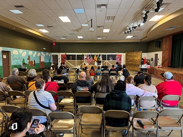 Image of Los Amigos' Walk Through California student presentations with a parent audience.. 