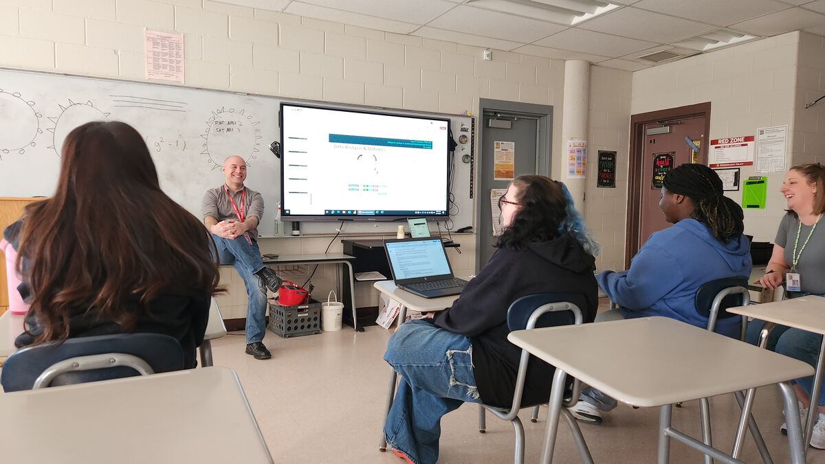 12th Grade Biomanufacturing Technology students listen to Dr. Jason Machan from Brown Health Group.