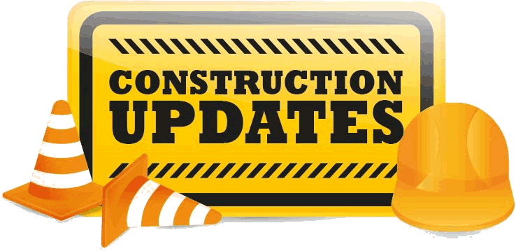Construction sign that reads Construction update with hard hat and two safety cones