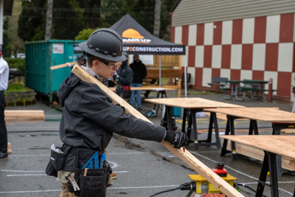 student working on a wood project