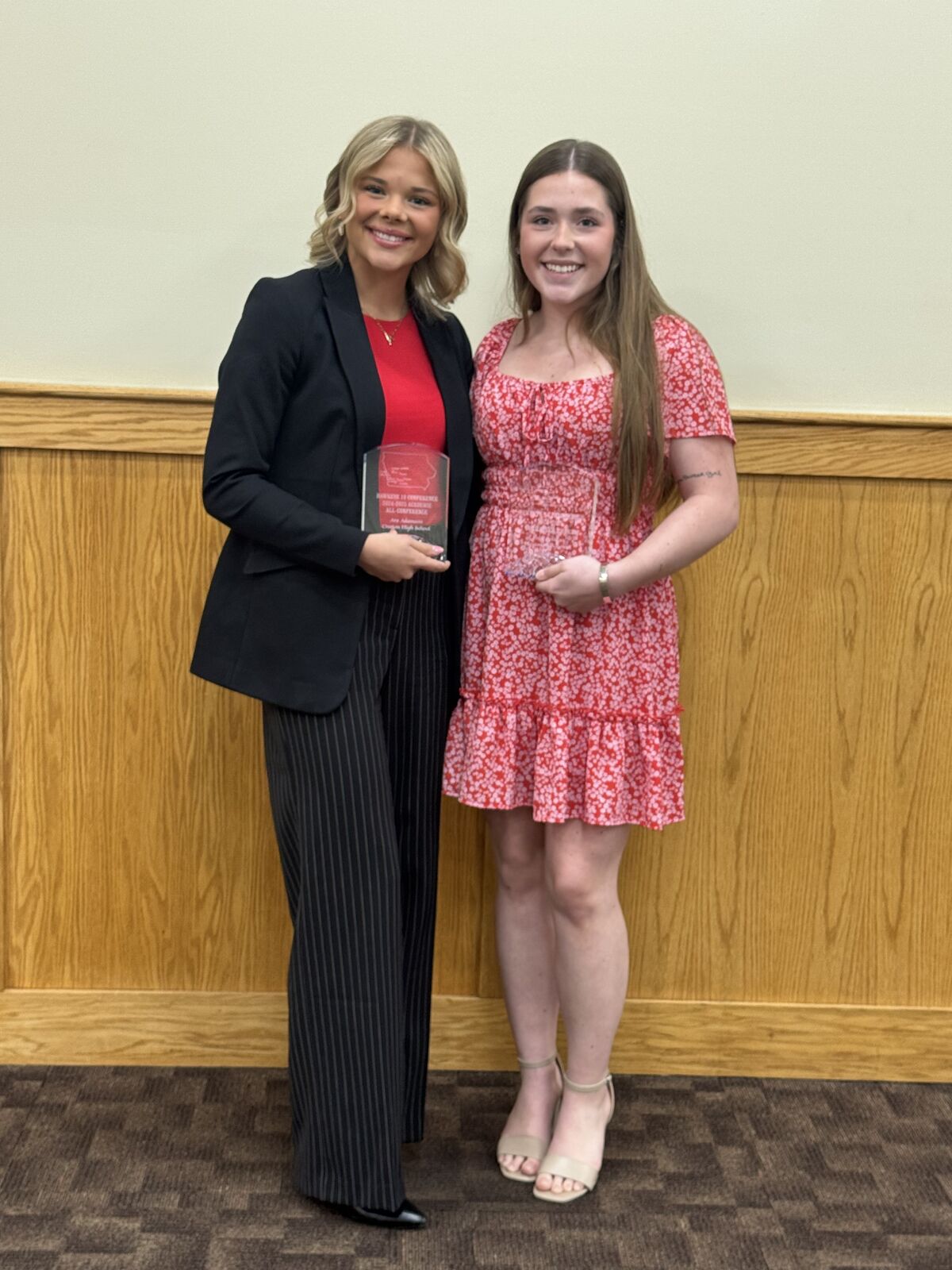 Photo of Ava Adamson (left) Hawkeye 10 Academic award winner for Creston HIgh School and Anna Bolinger (right) Hawkeye 10 Character Award winner for Creston High School 