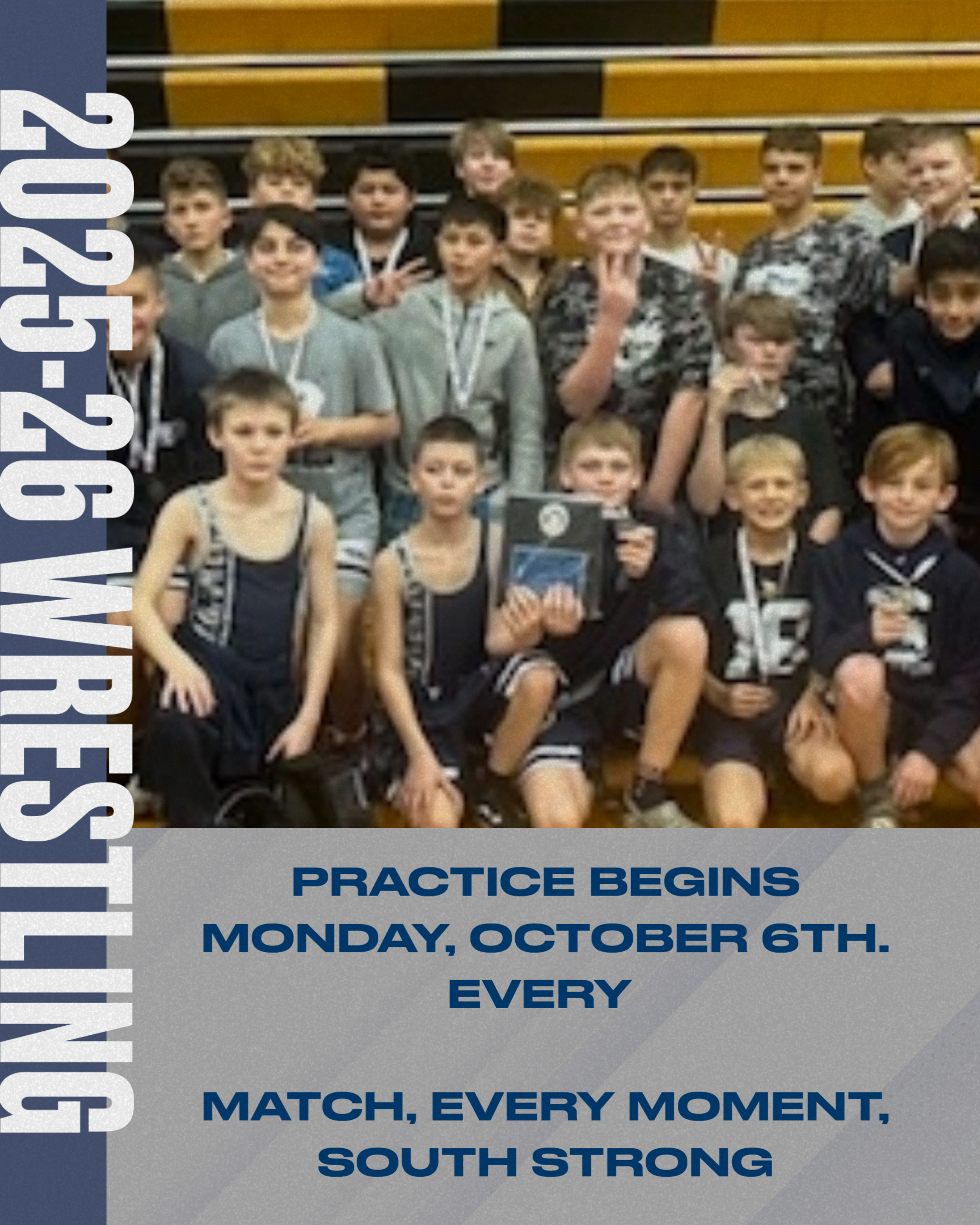 A group of young wrestlers pose for a team photo, some holding medals.