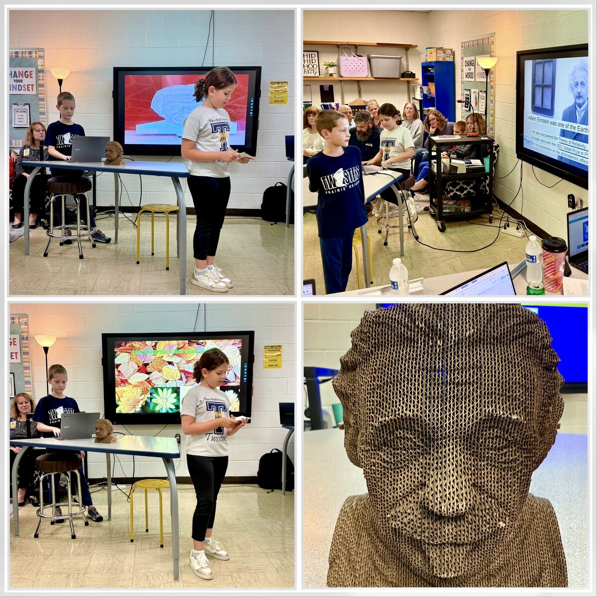 Students present in a classroom, with a large screen displaying information.