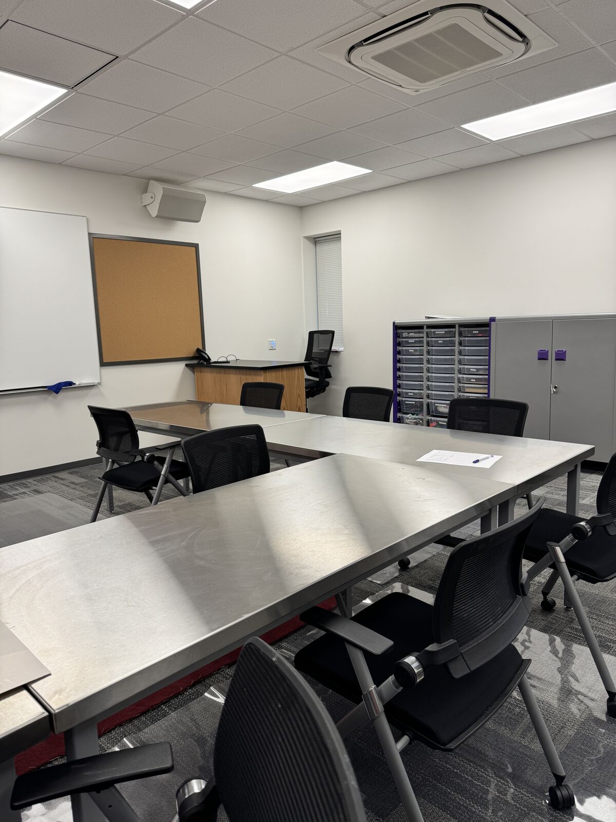 metal tables and plastic flooring make messy art projects fun