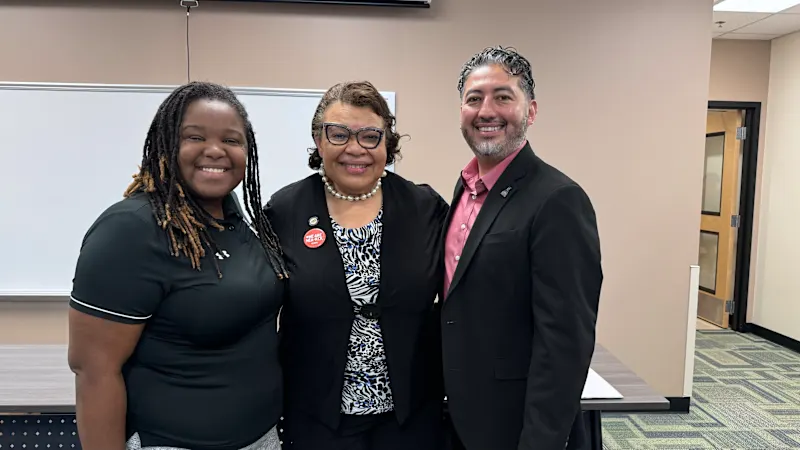 NEA VP takes photo with KCKPS board members