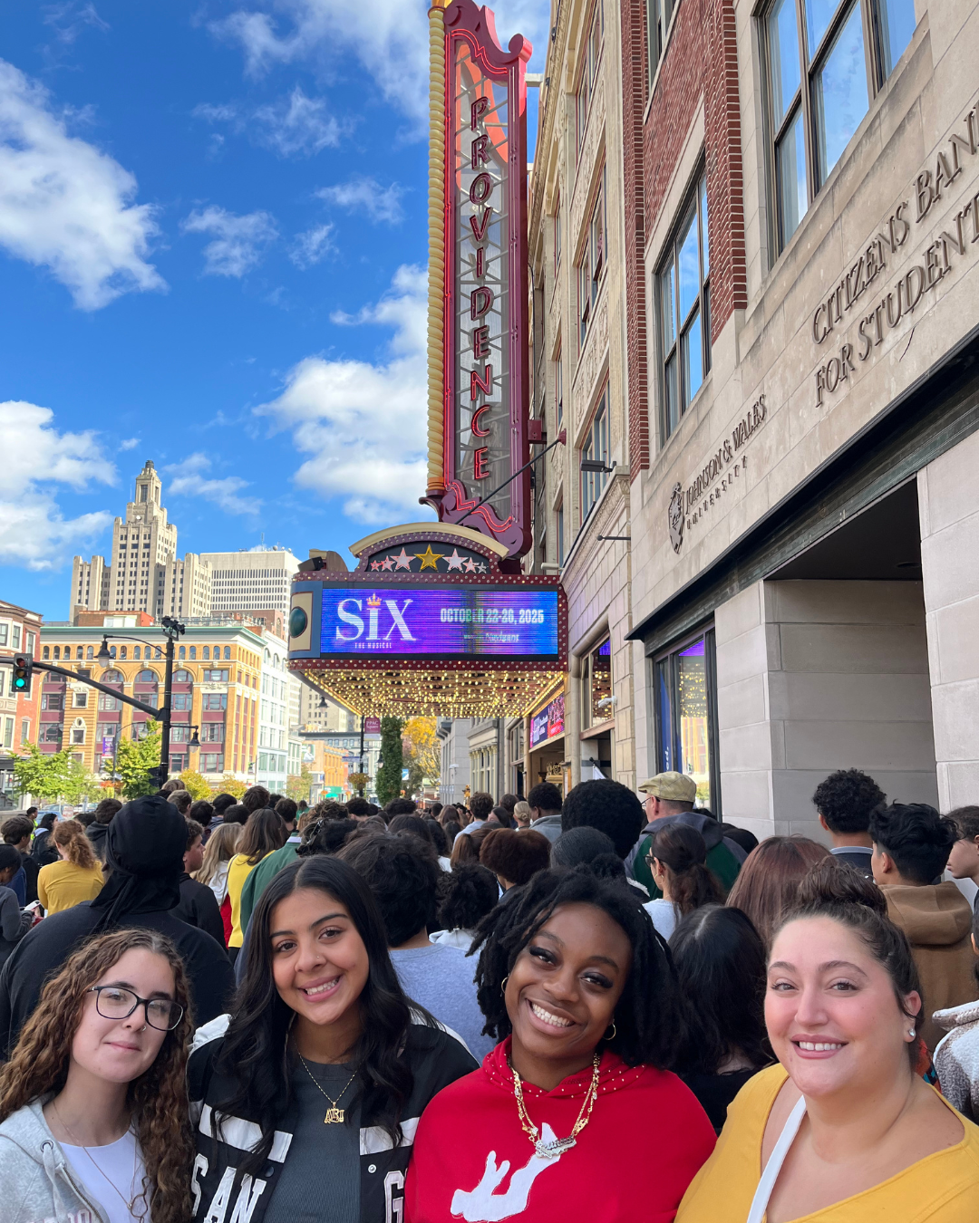 A crowd gathers outside the Providence Performing Arts Center, awaiting a show.