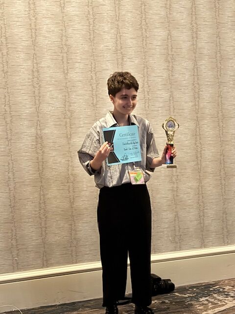 student accepting awards