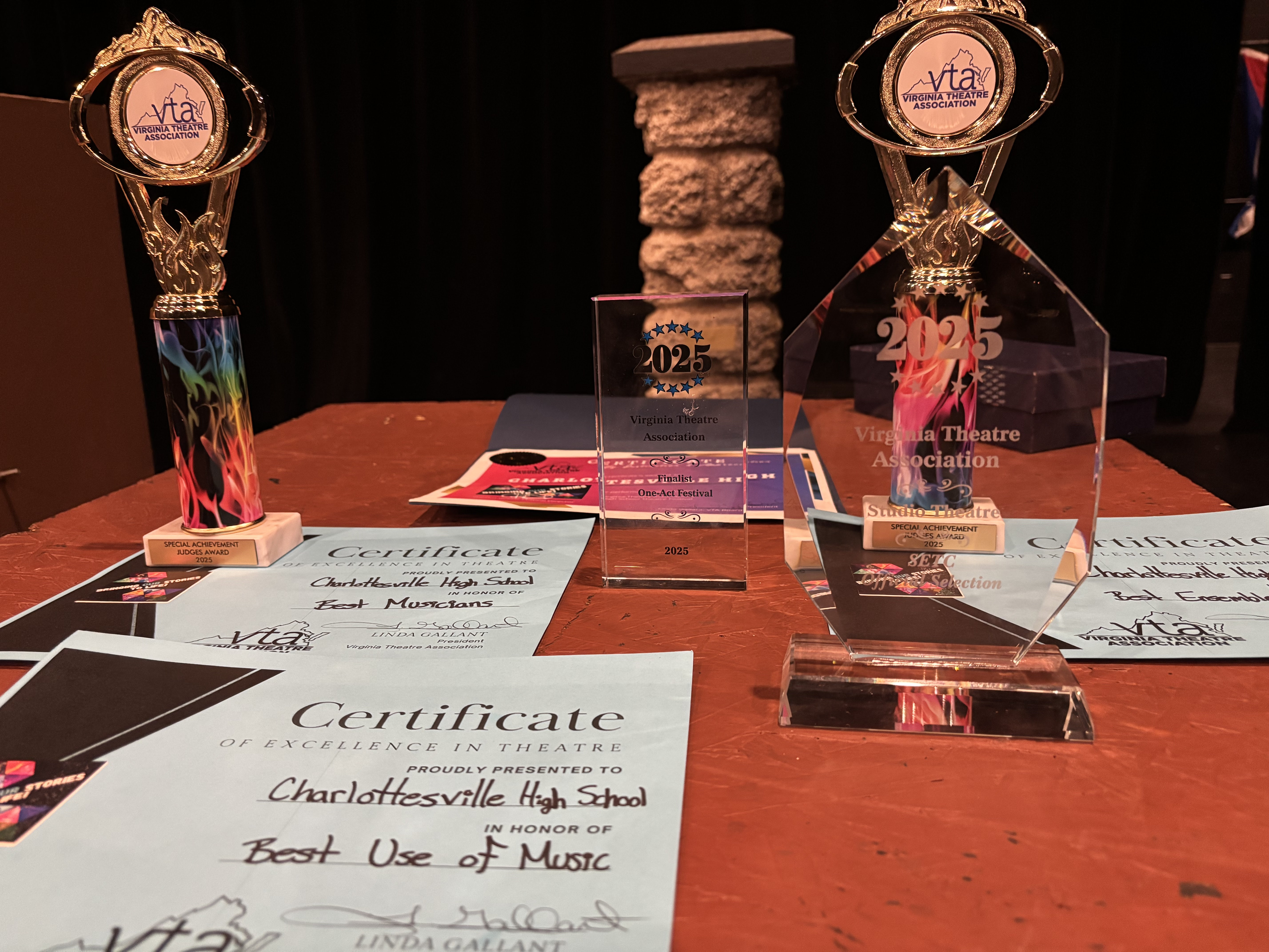Awards given to Theatre CHS displayed on table