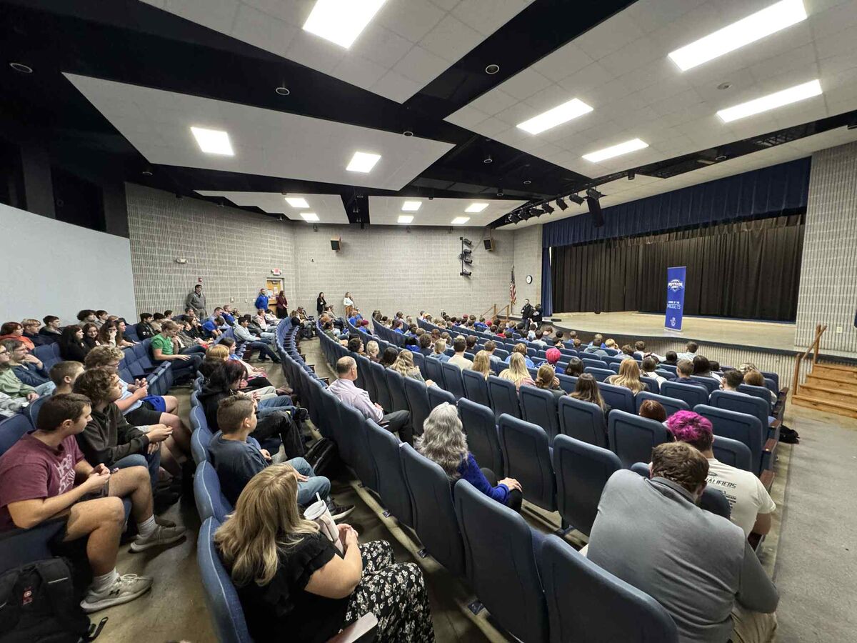 pchs students listening in an auditorium