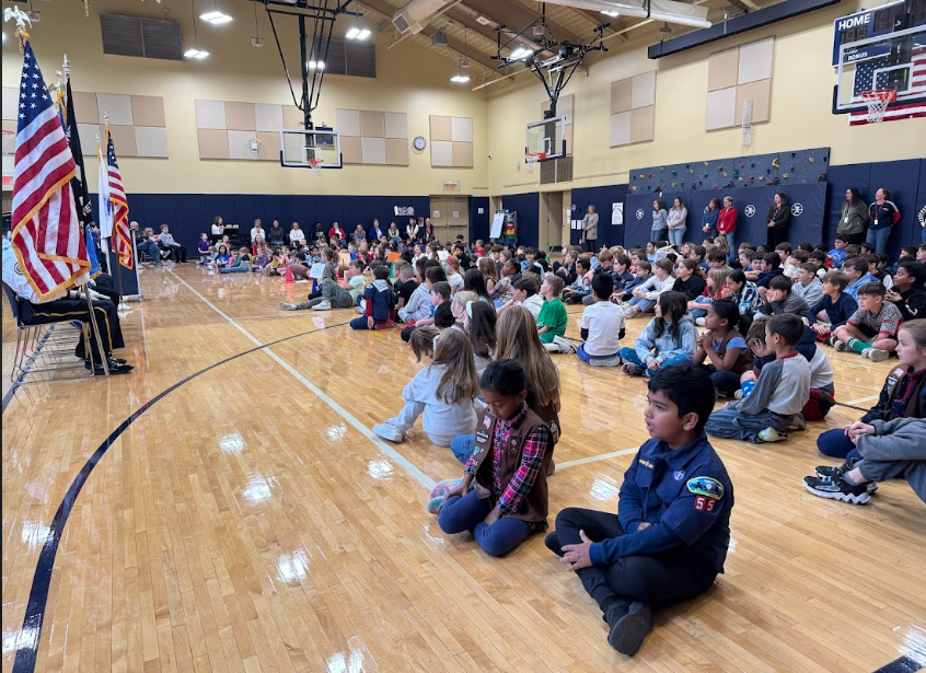 Students observe the assembly