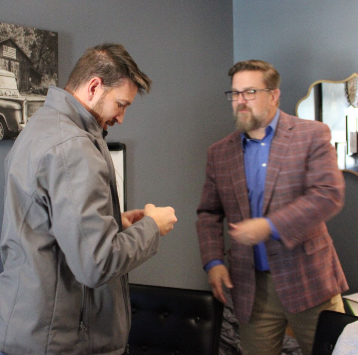 Dr. Robinson pictured with Mr. Aitchison in an office