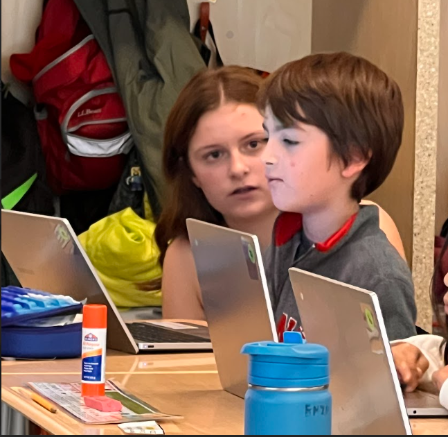 MMS student helping with math