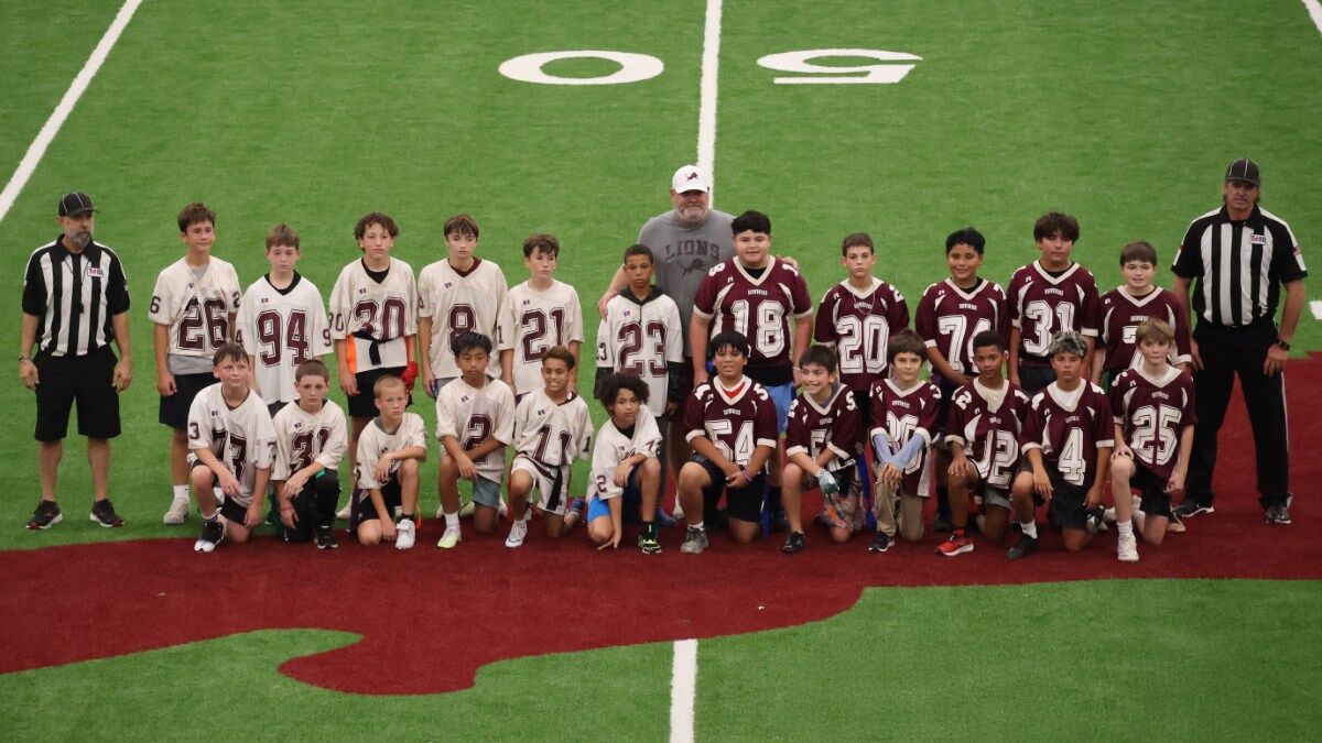 2025 Coggin 6th Grade Flag Football Super Bowl players, referees, and Coach Brown.