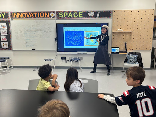 Kindergarten students view CAS program in the Innovation Space. 