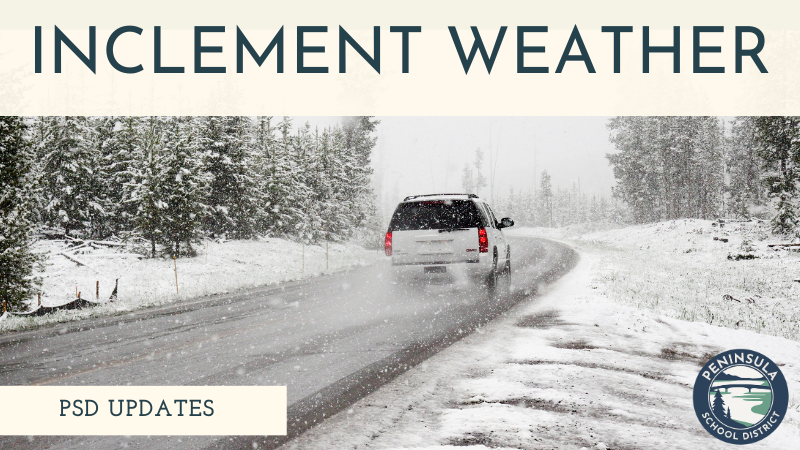 A white SUV drives on a snowy road, with trees lining the sides.