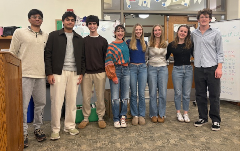 National Merit Commended students pose for photo in High School Library.