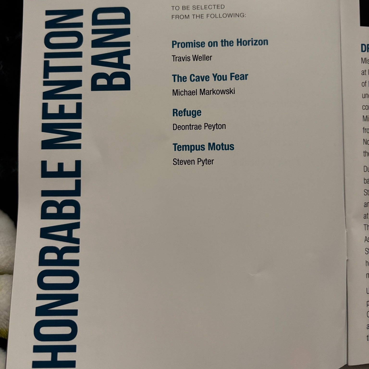 A document lists "HONORABLE MENTION BAND" with selected works and composers.
