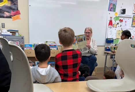 Mrs. Norsworthy returns to read at the annual Cookies and Cocoa Storytime