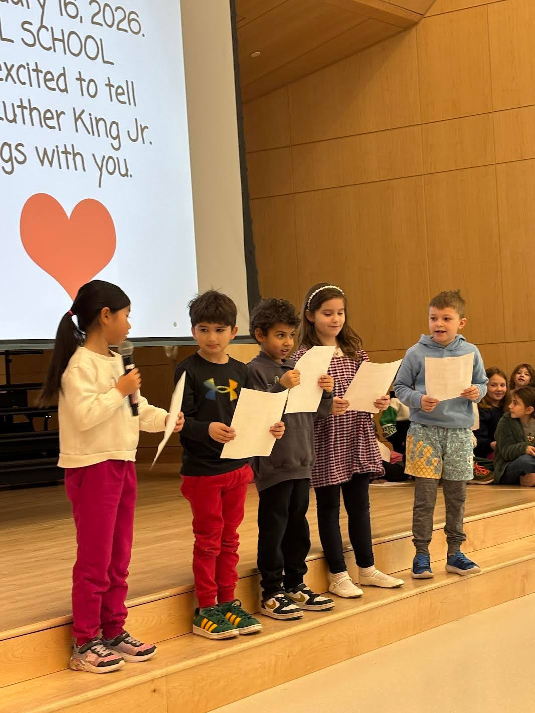 Students give a presentation on the life and legacy of Dr. Martin Luther King, Jr.