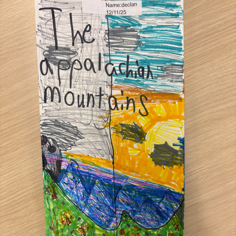 A child's drawing depicts the Appalachian Mountains with a split sky and colorful landscape.