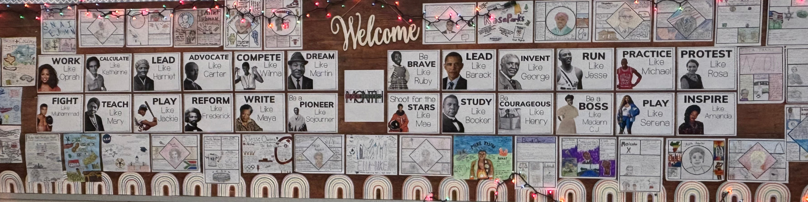 A bulletin board displays inspirational figures with motivational phrases like 'Work Like Oprah' and 'Dream Like Martin'.