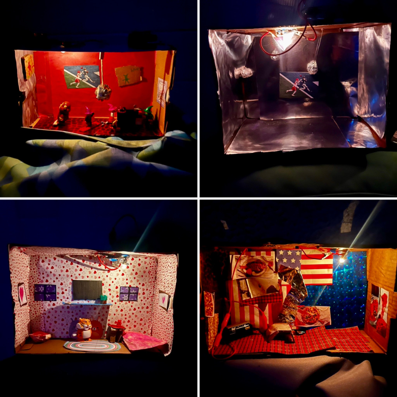 Four diorama scenes are displayed, each with unique decorations and miniature figures.