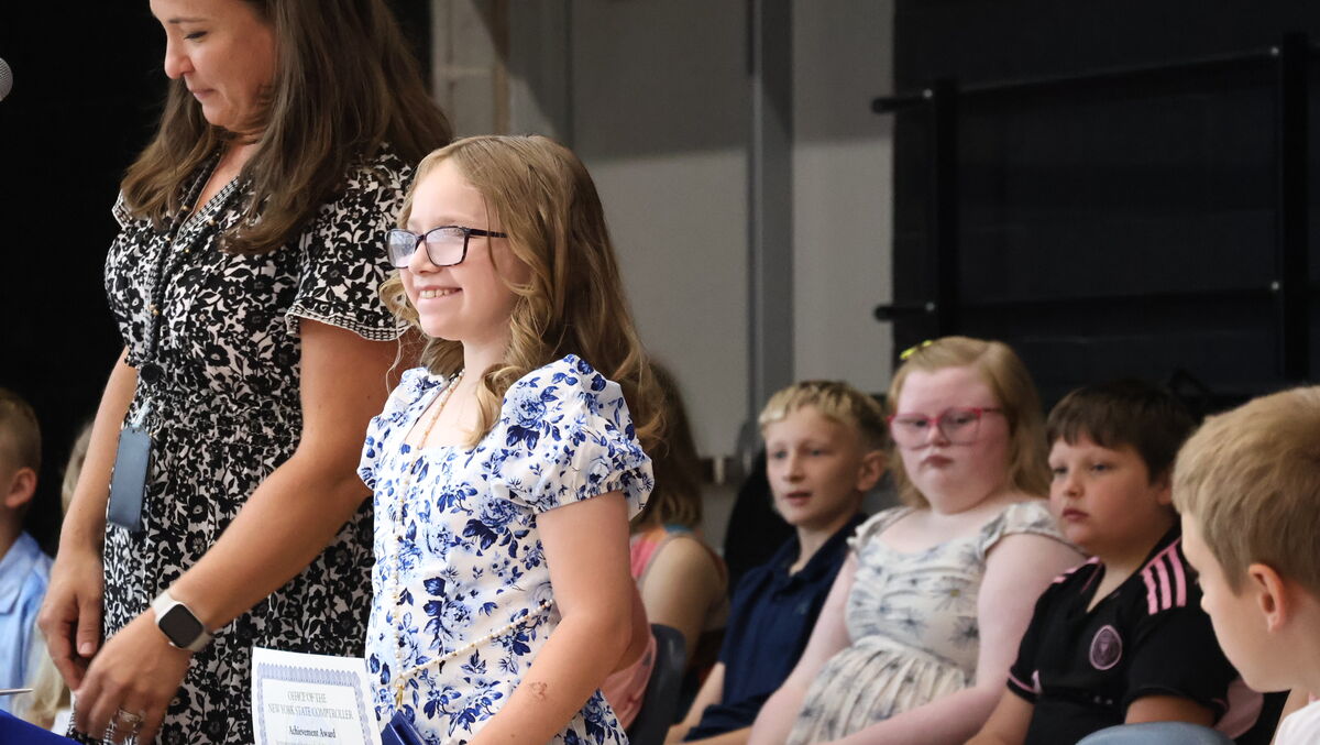 Students Receiving Awards at their Fourth Grade Moving Up Ceremony