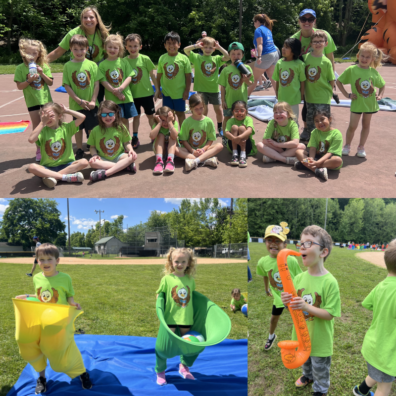 A group of children in matching green shirts with owl logos pose for a photo outdoors.