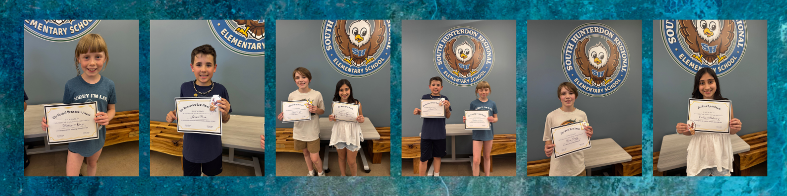 Students proudly hold certificates in front of a South Hunterdon Regional Elementary School logo.