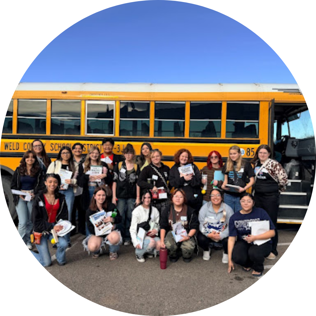Students in front of a bus
