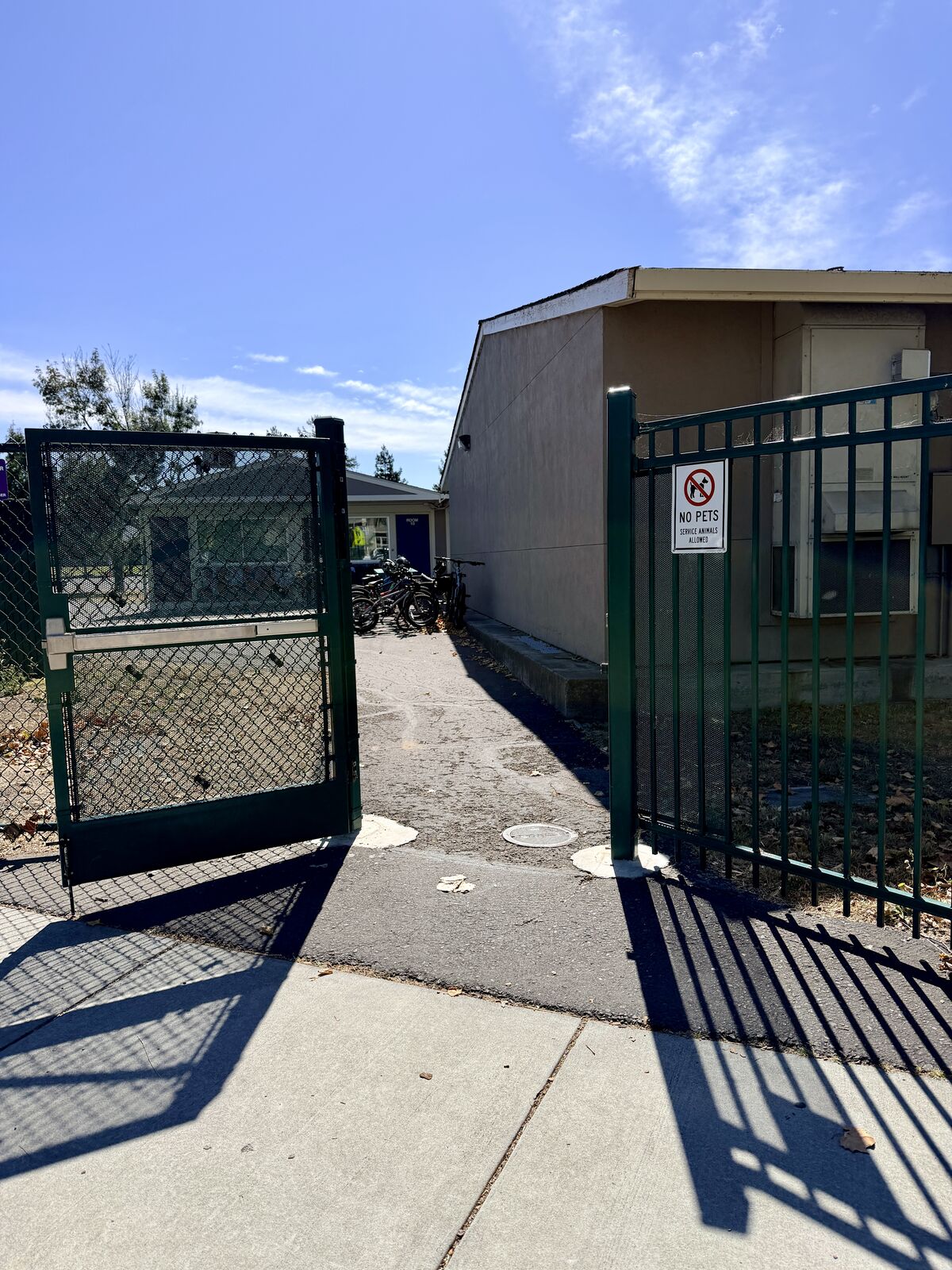 gate at Colombard near bike racks
