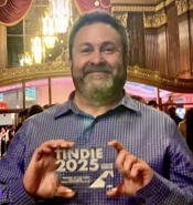 Phil Chidel receives Film Festival Award