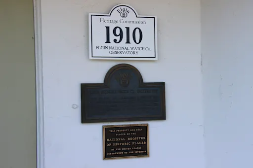 A plaque marks a building as being historic and dating back to 1910