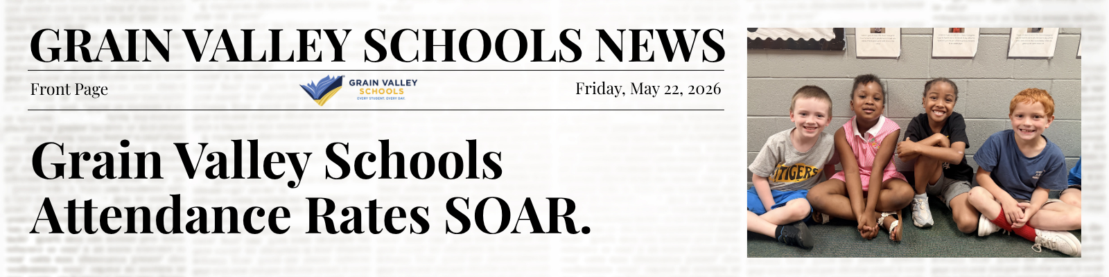 An appearance of a news paper article. Text reads: Grain Valley Schools News. Front Page, Friday, May 22, 2026. Grain Valley Schools Attendance Rates SOAR. Graphic includes photo of four students sitting in the hall.  