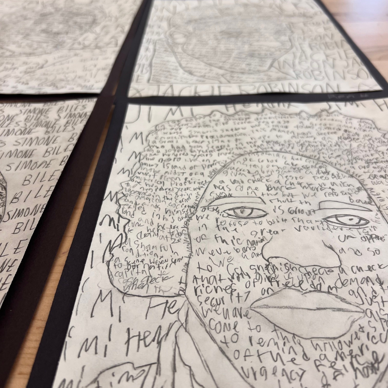 Close-up of a pencil drawing featuring a portrait composed of text, with the name 'SIMONE BILES' repeated on the left.