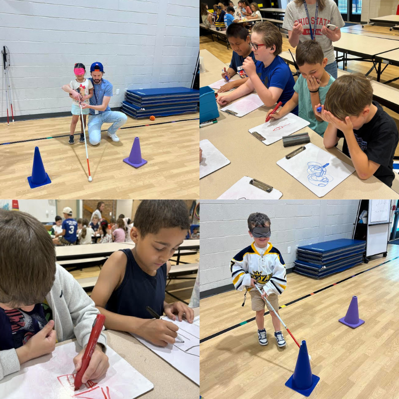 Children participate in an activity, some wearing blindfolds and using white canes.
