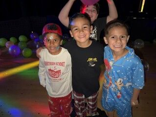 Image of Cucamonga Elementary School's first grade students at the middle dance party.