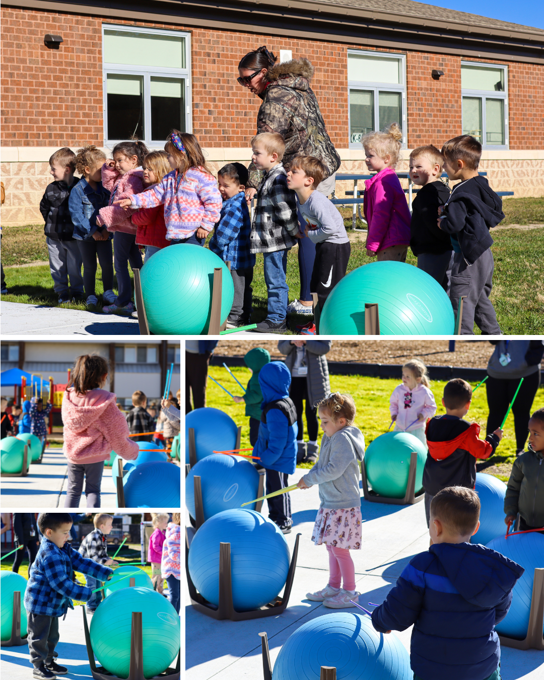A teacher guides a group of young children lined up outdoors, with large exercise balls placed on stands nearby.