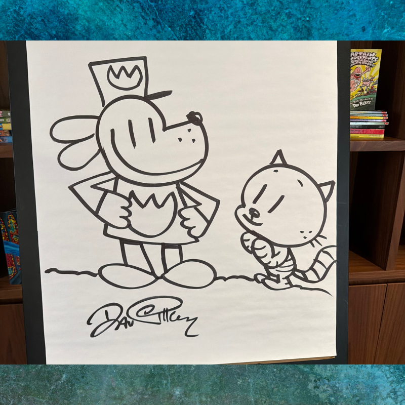 A black and white drawing of Dog Man and a cat character on a large sheet of paper.