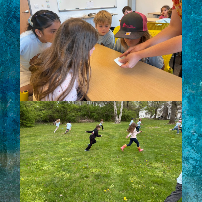 Children gather around a table, looking at a small white object held by an adult.