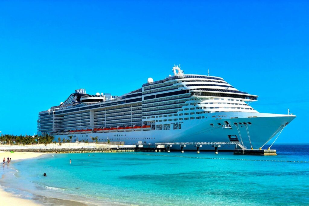 An MSC cruise ship below a clear sky