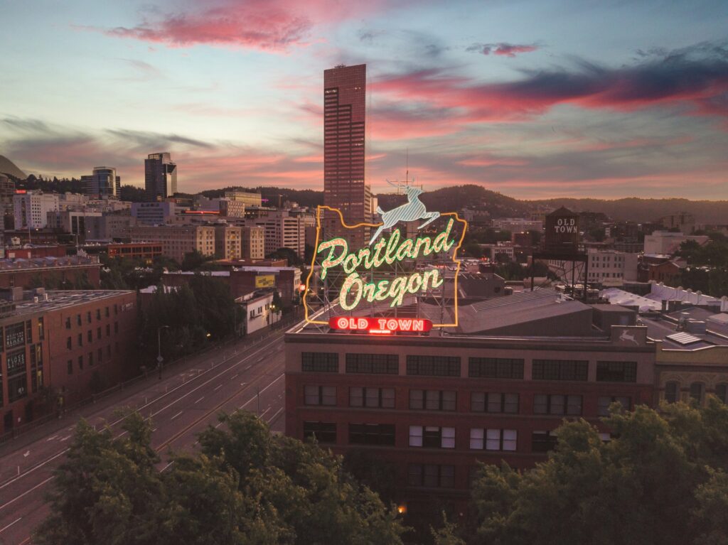 A brightly lit Portland Oregon sign