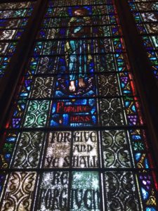 image of stained glass window from Clinton’s childhood church in Park Ridge, IL