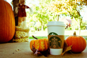image of pumpkin spice latte and pumpkins