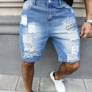 Men's summer blue ripped printed denim shorts. Trendy ripped design. Stylish text prints.