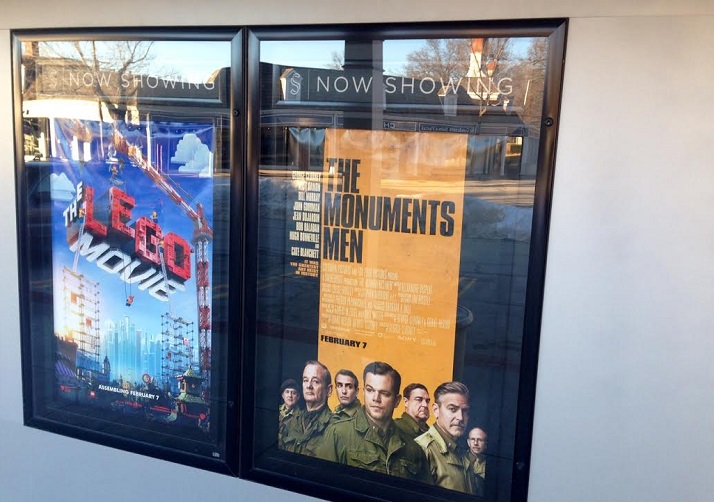 The promotional poster for The Monuments Men outside STANDEES at the Village Shops. George Clooney's character in the film is based on the father-in-law of Prairie Village resident Joanne Stout.