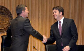 Dave Shepard welcomed new mayor Steve Schowengerdt to the podium. Shepard lost the mayoral race to Schowengerdt by 16 votes.
