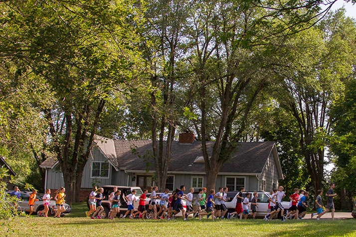 Students followed math teacher and coach Nick Dailey down Delmar Street for the team's first-ever training jog.